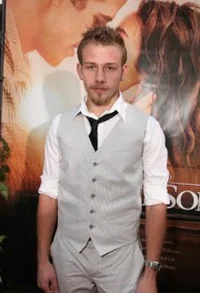 Адам Барнетт