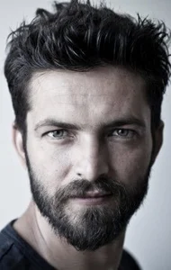 Илкер Кызмаз